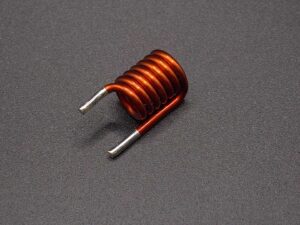SMD air coils, inductors prepared for automated pick-and-place assembly, SMT adhesive dots, stable transport and positioning of inductive components in modern SMD electronics manufacturing. | NEOTECH - Manufacturer of inductive components: coils and chokes, RFID components. Wire components. Manufacturer of machines and devices.SMD inductors, automatic assembly | SMD inductors, for automatic pick-and-place assembly, with applied SMT adhesive dots, stable transport and positioning of inductive components in modern SMD electronics production processes | NEOTECH - Manufacturer of inductive components. Coils, Chokes, Antennas, Heaters, Transformers. www.neotech.pl/induction | SMD inductors, automatic assembly | Induction Coil