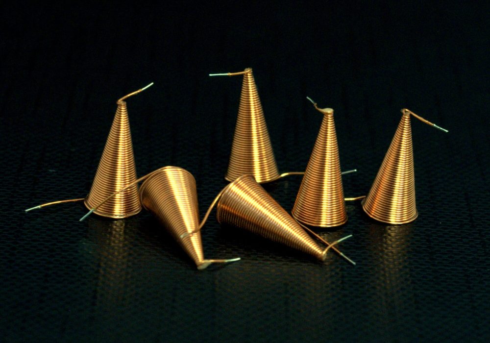 NEOTECH - Manufacturer of inductive components: coils and chokes, RFID components. Wire components. Manufacturer of machines and devices. SMD inductors, automatic assembly | SMD inductors for automatic pick-and-place assembly, with applied SMT adhesive dots, stable transport and positioning of inductive components in modern SMD electronics production processes | NEOTECH - Manufacturer of inductive components. Coils, Chokes, Antennas, Heaters, Transformers. www.neotech.pl/induction | SMD inductors, automatic assembly | Induction Coil