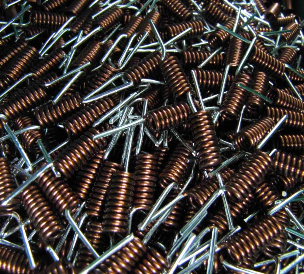 THT and SMD air coils, inductors prepared for automated pick-and-place assembly, SMT adhesive dots, stable transport and positioning of inductive components in modern SMD electronics manufacturing. | NEOTECH - Manufacturer of inductive components: coils and chokes, RFID components. Wire components. Manufacturer of machines and devices.SMD inductors, automatic assembly | SMD inductors, for automatic pick-and-place assembly, with applied SMT adhesive dots, stable transport and positioning of inductive components in modern SMD electronics production processes | NEOTECH - Manufacturer of inductive components. Coils, Chokes, Antennas, Heaters, Transformers. www.neotech.pl/induction | SMD inductors, automatic assembly | Induction Coil