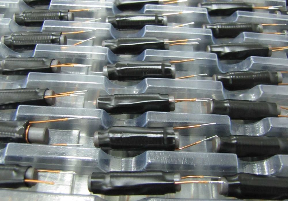 NEOTECH - Manufacturer of inductive components: coils and chokes, RFID components. Wire components. Manufacturer of machines and devices.