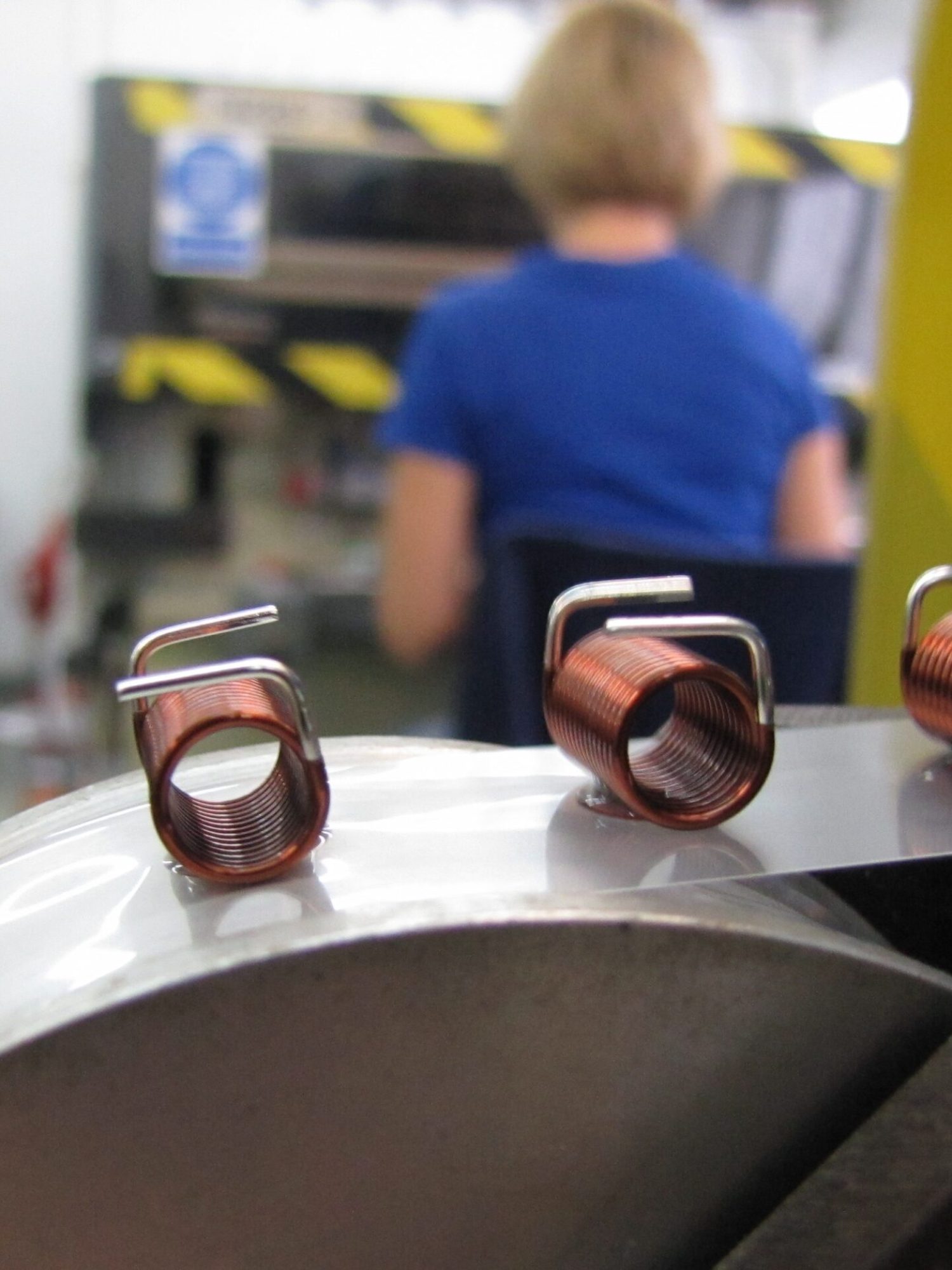 SMD air coils, inductors prepared for automated pick-and-place assembly, SMT adhesive dots, stable transport and positioning of inductive components in modern SMD electronics manufacturing. | Manufacturer of inductive components: coils and chokes, RFID components. Wire components. Manufacturer of machines and devices. Representative of Neosid Pemetzrieder GmbH &Co. KG. in Poland. |