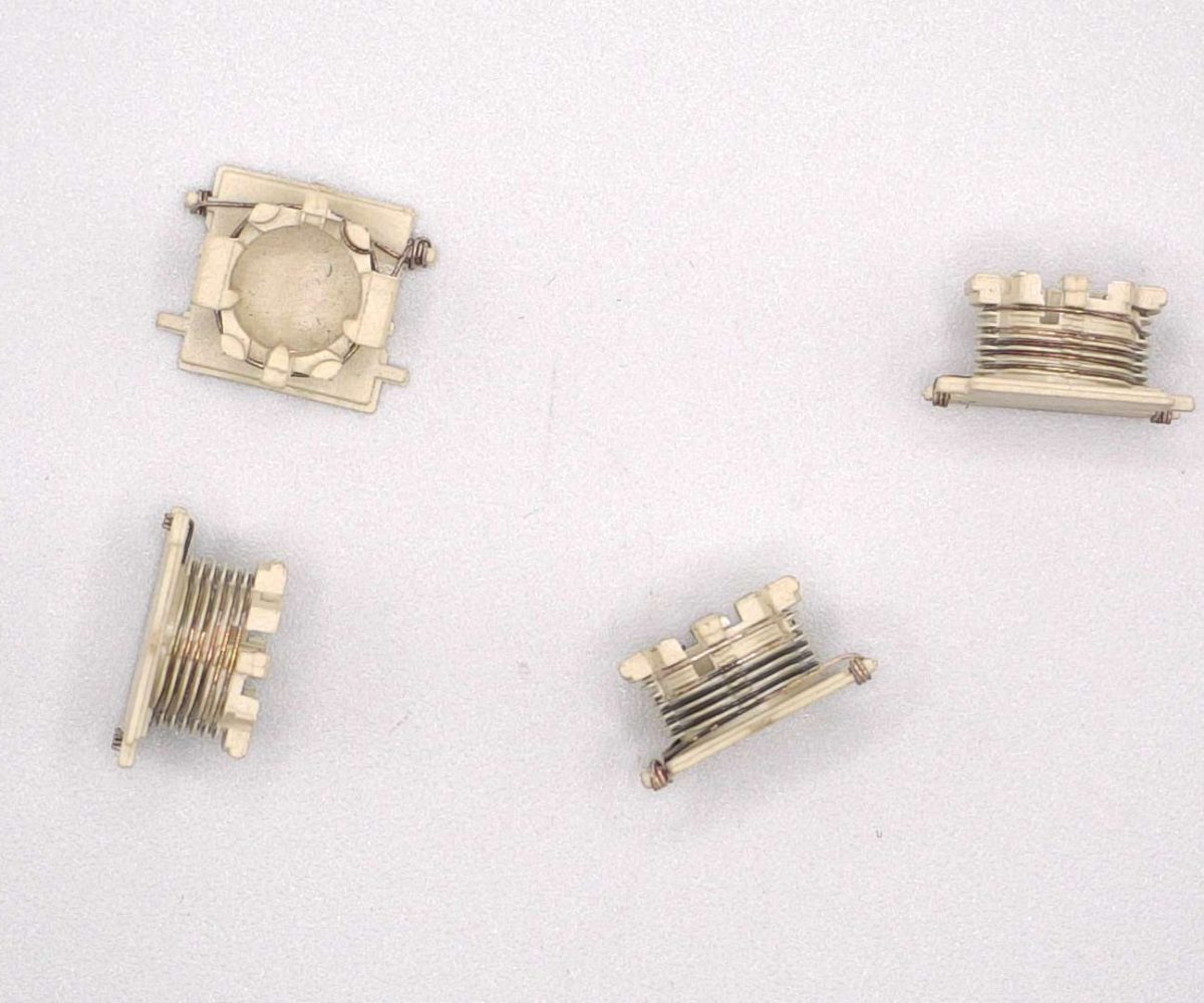 NEOTECH - Manufacturer of inductive components: coils and chokes, RFID components. Wire components. Manufacturer of machines and devices. SMD inductors, automatic assembly | SMD inductors for automatic pick-and-place assembly, with applied SMT adhesive dots, stable transport and positioning of inductive components in modern SMD electronics production processes | NEOTECH - Manufacturer of inductive components. Coils, Chokes, Antennas, Heaters, Transformers. www.neotech.pl/induction | SMD inductors, automatic assembly | Induction Coil