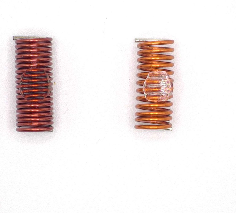 SMD air coils, inductors prepared for automated pick-and-place assembly, SMT adhesive dots, stable transport and positioning of inductive components in modern SMD electronics manufacturing. NEOTECH - Manufacturer of inductive components: coils and chokes, RFID components. Wire components. Manufacturer of machines and devices.SMD inductors, automatic assembly | SMD inductors, for automatic pick-and-place assembly, with applied SMT adhesive dots, stable transport and positioning of inductive components in modern SMD electronics production processes | NEOTECH - Manufacturer of inductive components. Coils, Chokes, Antennas, Heaters, Transformers. www.neotech.pl/induction | SMD inductors, automatic assembly | Induction Coil