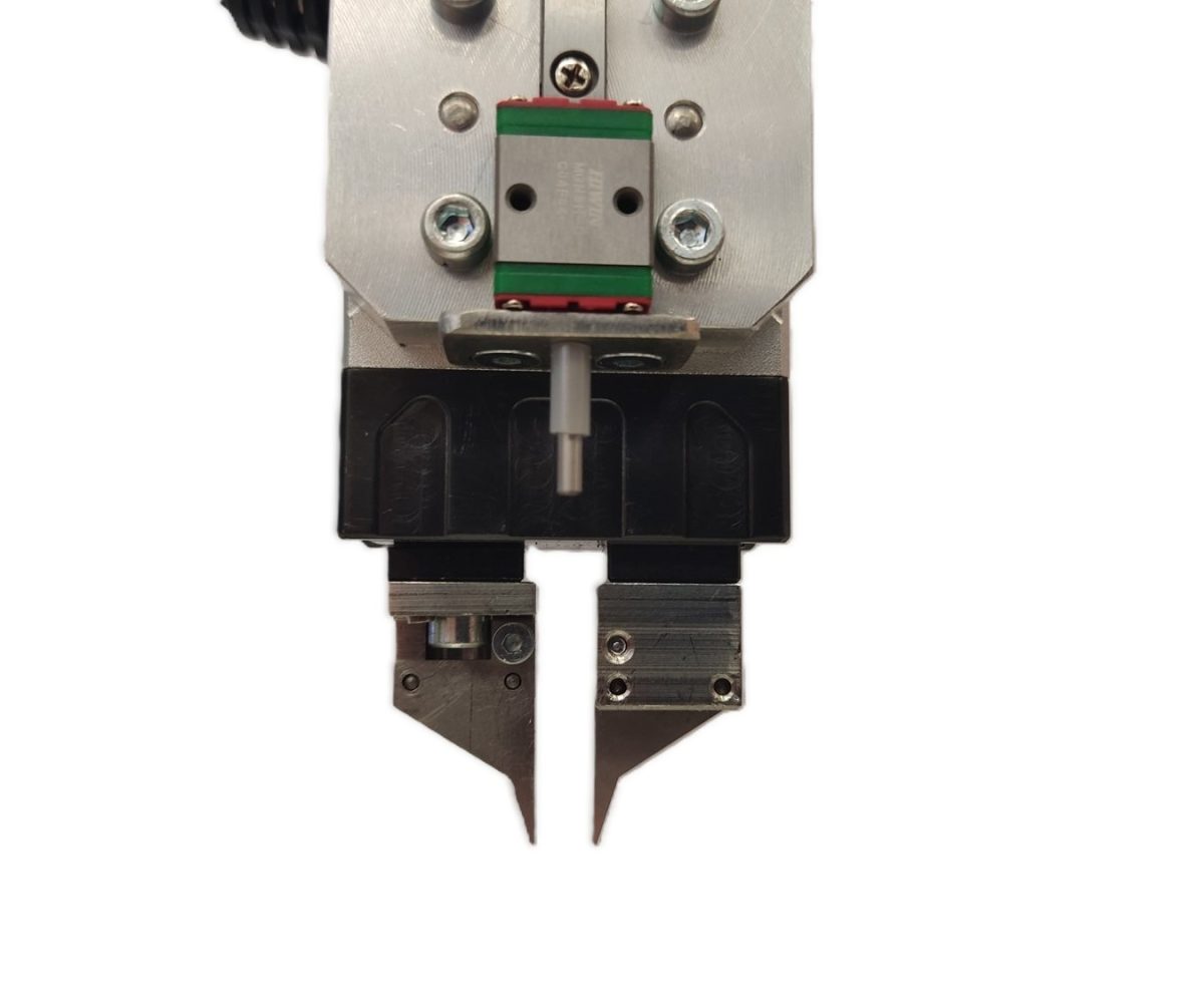 SPR-01 - Zautomatyzowana maszyna kontroli jakości. Selekcja i pakowanie rdzeni ferrytowych z systemem wizyjnym i robotem przemysłowym SCARA. Kontrola | NEOTECH